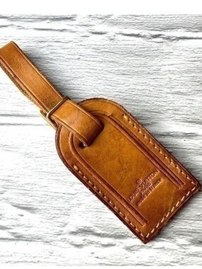 Authentic vintage Louis Vuitton luggage tag